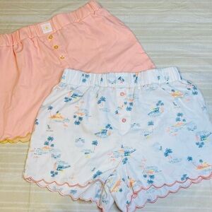 2 Pairs of Rae Dunn Peach with yellow ruffle and White beachy with pink PJ’s